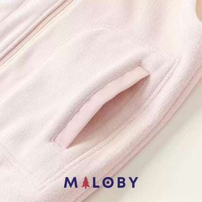 Veste sans manches en sherpa enfant fille rose, idéale pour les vêtements anti-allergiques.