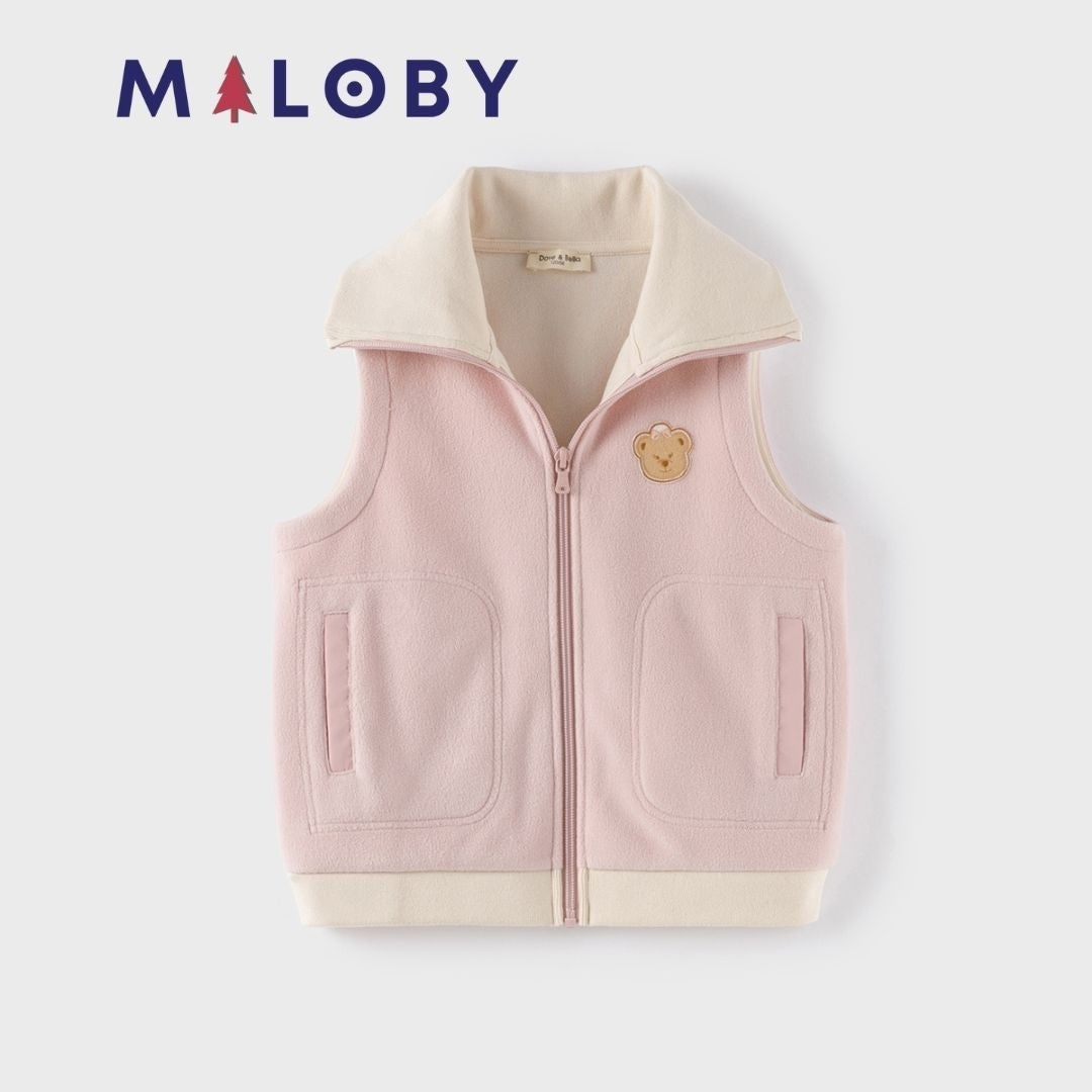 Veste sans manches en sherpa enfant fille rose, idéale pour les vêtements anti-allergiques.